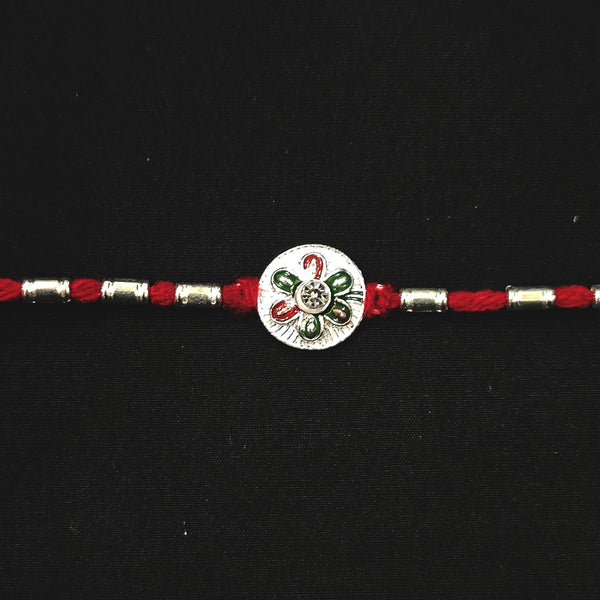 Stylish Silver Colored Charm Rakhi on Red Thread