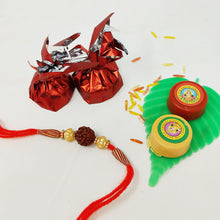 Divine Rudraksha Rakhi , Tilak set , assorted chocolates  Celebration Combo
