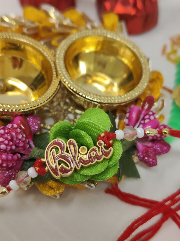 Delight Combo of Bhai Rakhi handmade golden roli plate with assorted chocolates and tilak set